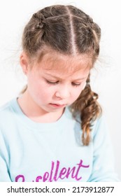 Little Girl Learning How To Sew With Sewing Craft Kit For Kids.