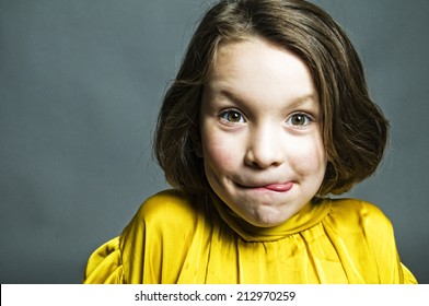 Little Girl Licking Her Lips