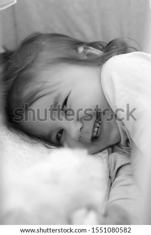 Similar – kid girl relaxing at home in weekend morning