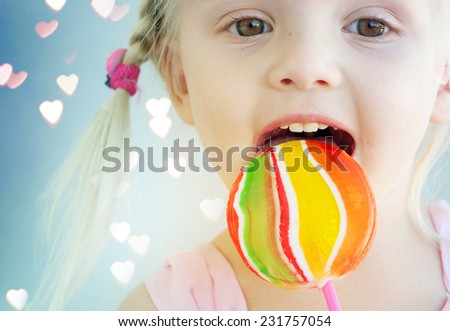 little girl with  lollipop 