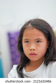 Little Girl Looking Up Worried Facial Expression