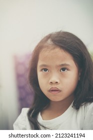 Little Girl Looking Up Worried Facial Expression