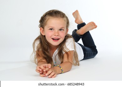 Similar Images, Stock Photos & Vectors of Little girl lying on the ...