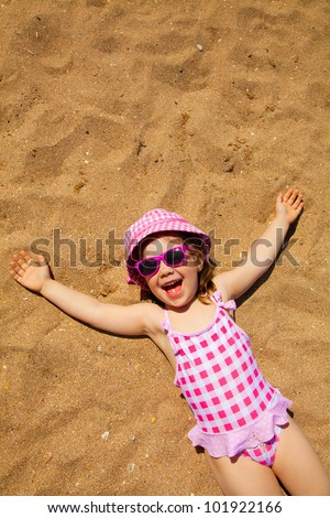 Little Girl Lying On Sandy Beach Stock Photo (Edit Now ...