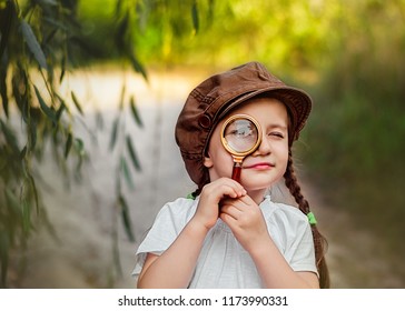 Little Girl With Magnifying. Little Detective