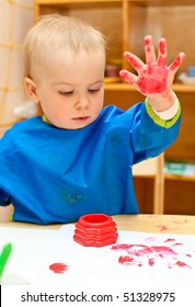 Little Girl Make A Finger Paint