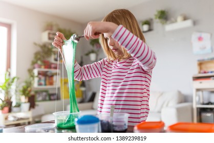 Little Girl Making Homemade Slime Toy