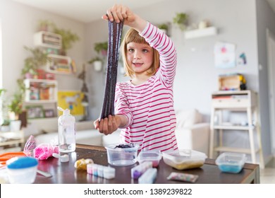 Little Girl Making Homemade Slime Toy