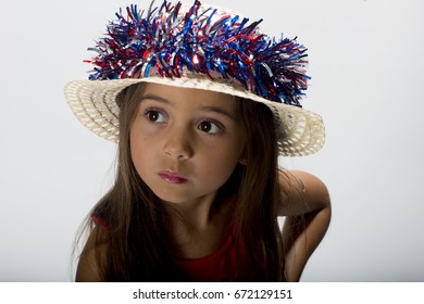 Little Girl Model Looking Off Camera White Background With Hat On 