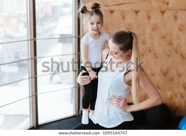 Little Girl Mom Posing On Camera Stock Photo Edit Now 1095164747