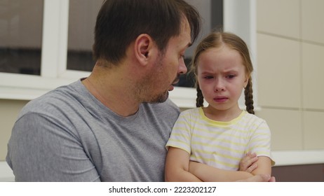 little girl was offended her father. conversation between little child father. kid upset badly behaves without obeying parent. man explain his daughter rules conduct. tear baby eye. crying child dream - Shutterstock ID 2223202127