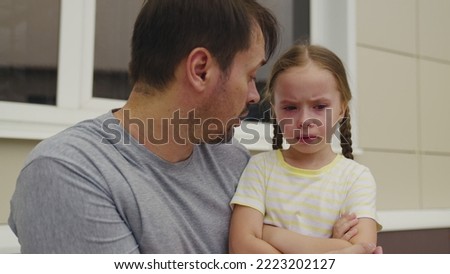 little girl was offended her father. conversation between little child father. kid upset badly behaves without obeying parent. man explain his daughter rules conduct. tear baby eye. crying child dream