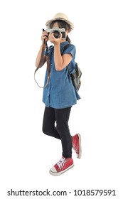 Little Girl With An Old Camera Shooting Indoor. Kid Taking A Photo Using A Vintage Retro Film Camera. 