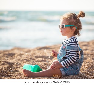 Little Girl On The Beach