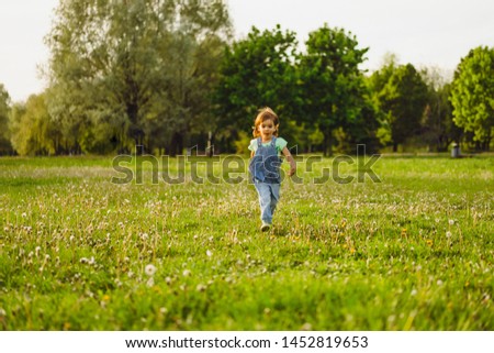 Similar – Small child with long blond hair