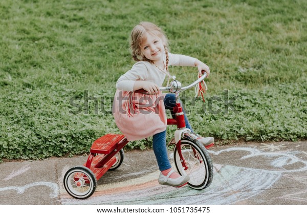 little red tricycle