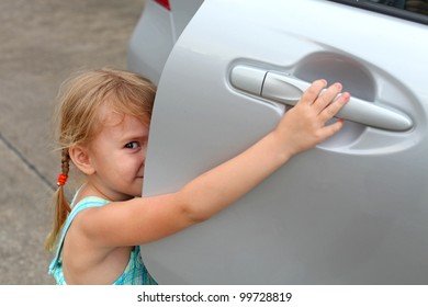 The Little Girl Opens The Car Door