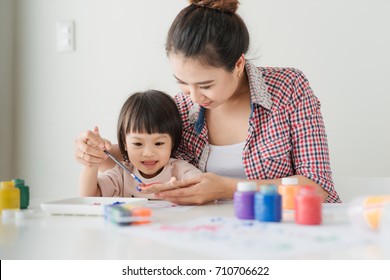 861 Asian mom kid painting Images, Stock Photos & Vectors | Shutterstock