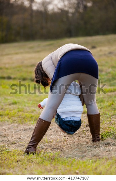 Little Girl Peeing Helped By Her Stock Photo Edit Now