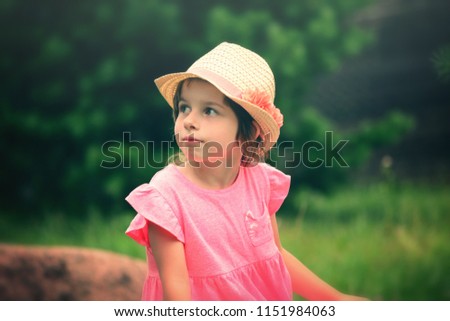 Similar – beautiful baby looking very funny into the the camera