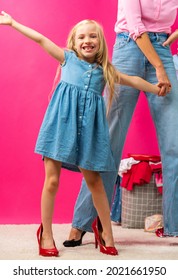 Little Girl Playing Dress Up. Little Girl Wearing Mothers Clothing Evening Dress And Felt Hat, Lady Shoes. Learning To Be A Woman. Growing Up Concept