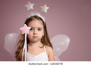 Little girl playing fairy - Powered by Shutterstock