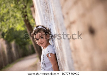 Similar – Image, Stock Photo Adorable little girl combed with pigtails