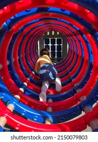 Little Girl Playing Inside Loops