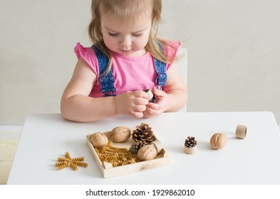 Little Girl Playing With Natural Materials. Easy Sensory Activities For Babies Toddler, Preschoolers. Activities Montessori, Games For Sensory Processing Disorder, Child Development 