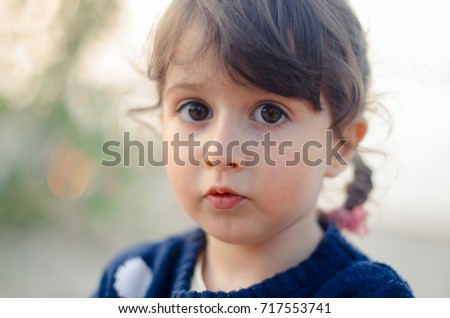 Similar – Adorable little girl combed with pigtails