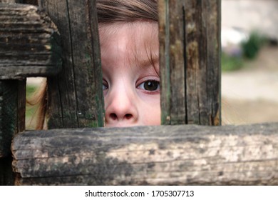 Little Girl Playing Peekaboo Game