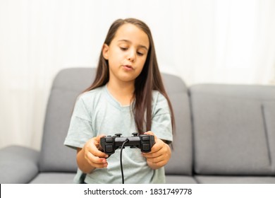 girl playing playstation