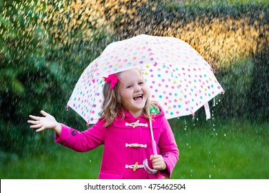 13,082 Kids playing puddles Images, Stock Photos & Vectors | Shutterstock