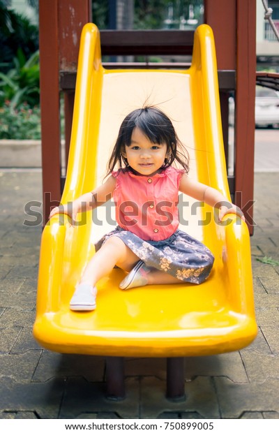 Little Girl Playing Slider Play Playground Stock Photo (Edit Now) 750899005