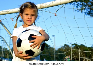 Little girl playing soccer