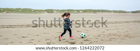 Similar – Girl and senior woman playing on the beach