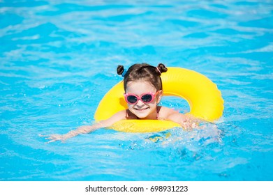 Little Girl Swims Pool Yellow Life Stock Photo 548109721 