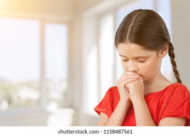 Little Girl Praying On Sky Background Stock Photo 1158487561 