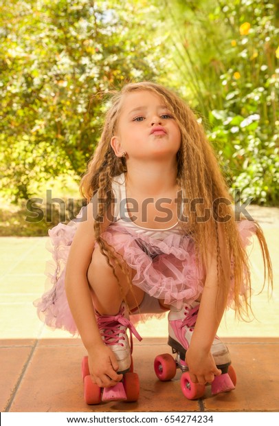 Little Girl Preschool Crouching On Ground Stock Photo (Edit Now) 654274234