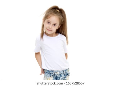 Little Girl In A Pure White T-shirt For Advertising And Shorts.