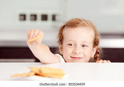 Little Girl Reaching For Food