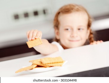 Little Girl Reaching For Food