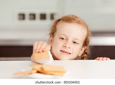 Little Girl Reaching For Food