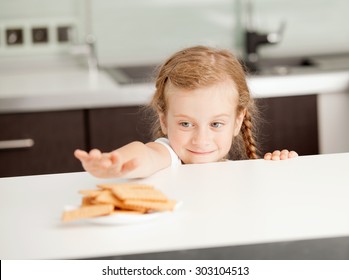 Little Girl Reaching For Food