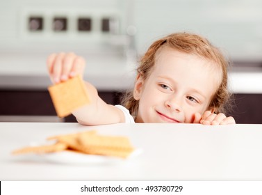 Little Girl Reaching For Food