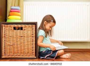 Little Girl Reading A Book