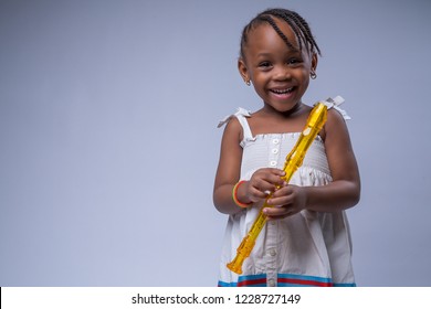 Little Girl With Recorder