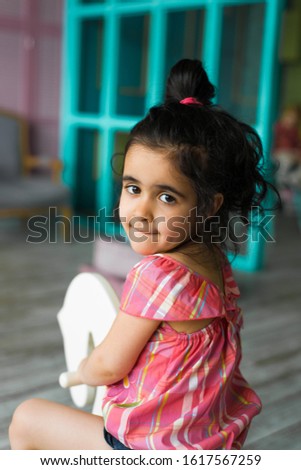 Similar – Image, Stock Photo Adorable little girl combed with pigtails