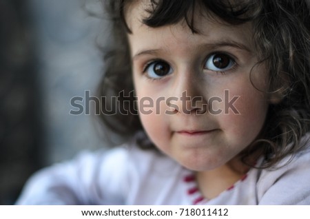 Similar – Image, Stock Photo Adorable little girl combed with pigtails