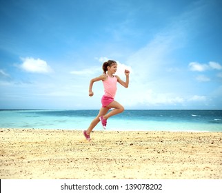 Little Girl Running Along  Ocean